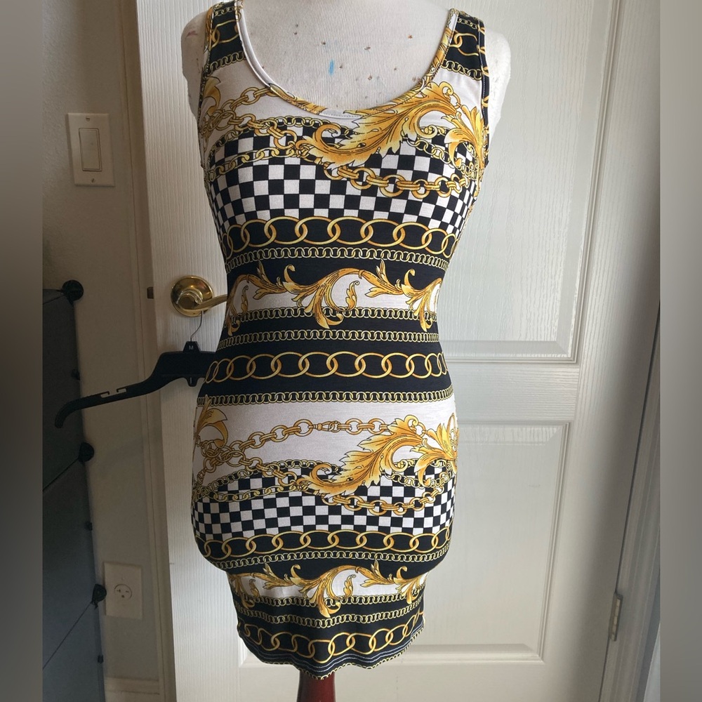 Elegant Black and Gold Chain Print Dress